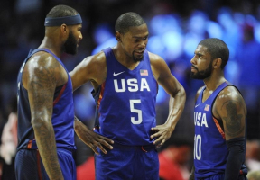 Los Angeles, CA, USA; USA guard Kevin Durant (5) speaks with center DeMarcus Cousins (left) and guard Kyrie Irving (right) before game action against China in the first half during an exhibition basketball game at Staples Center.  <br/>Gary A. Vasquez-USA TODAY Sports