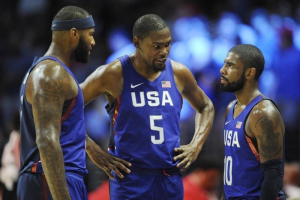Los Angeles, CA, USA; USA guard Kevin Durant (5) speaks with center DeMarcus Cousins (left) and guard Kyrie Irving (right) before game action against China in the first half during an exhibition basketball game at Staples Center.  <br/>Gary A. Vasquez-USA TODAY Sports