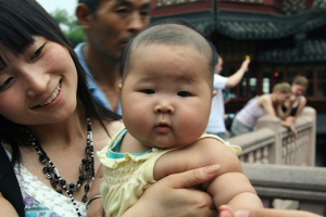 A woman in China who is 8-months pregnant has been ordered by the Communist government to abort her baby - or she and her husband will lose their jobs and face a hefty fine. In 2015, China ended the restrictive one-child policy that reduced its population by 400 million over the past 35 years. <br/>Evan HB / Flickr