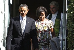 President Barack Obama and first lady Michelle Obama leave St. John's Episcopal Church as Rev. Luis Leon follows after services in Washington, Sunday, Sept. 19, 2010. <br/>AP Images / Charles Dharapak