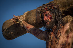 Santoro playing Jesus Christ in the scene of crucifixion.  <br/>