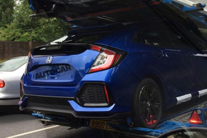 The 2017 Honda Civic hatchback spotted from its rear, where it is ready and waiting to be deployed in Europe.  <br/>Autocar