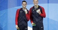 USA divers with Olympic silver thank God for their identity in Christ for their podium finish
