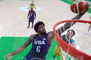 DeAndre Jordan (USA) of the USA pulls in a rebound over David Andersen (AUS) of Australia.  <br/>REUTERS/Mike Ehrmann/Pool