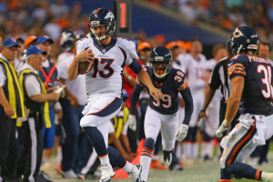 Aug 11, 2016; Chicago, IL, USA; Denver Broncos quarterback Trevor Siemian (13) runs with the ball against Chicago Bears cornerback Jacoby Glenn (39) during the second quarter at Soldier Field.  <br/>Dennis Wierzbicki-USA TODAY Sports