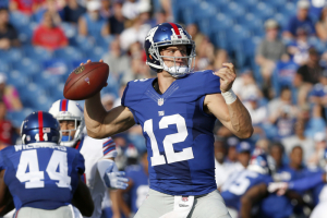 New York Giants quarterback Ryan Nassib (12) throws a pass during the second half against the Buffalo Bills at New Era Field. Bills beat the Giants 21 to 0. <br/>Timothy T. Ludwig-USA TODAY Sports