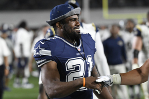 Los Angeles, CA, USA; Dallas Cowboys running back Ezekiel Elliot (21) smiles after the game against the Los Angeles Rams at Los Angeles Memorial Coliseum.  <br/>Richard Mackson-USA TODAY Sports