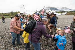 Veterans and their spouses are greeted by the town and our staff as they arrive at Samaritan Lodge Alaska off the shores of Lake Clark. <br/>Samaritan's Purse