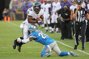 Baltimore, MD, USA; Baltimore Ravens running back Justin Forsett (29) is tackled after a run by Detroit Lions cornerback Quandre Diggs (28) at M&T Bank Stadium.  <br/>Mitch Stringer-USA TODAY Sports