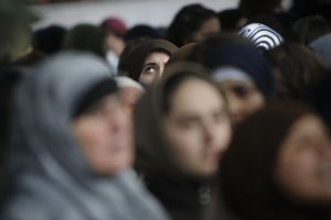Kosovo Muslim woman participate in a protest in the capital Pristina on Friday, Oct. 8, 2010. <br/>AP Photo / Visar Kryeziu