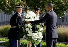 U.S. President Barack Obama places a wreath during a ceremony marking the 15th anniversary of the 9/11 attacks at the Pentagon in Washington, U.S., September 11, 2016. REUTERS/Joshua Roberts <br/>