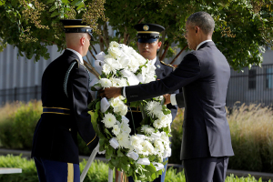 U.S. President Barack Obama places a wreath during a ceremony marking the 15th anniversary of the 9/11 attacks at the Pentagon in Washington, U.S., September 11, 2016. REUTERS/Joshua Roberts <br/>