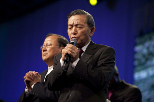 (r-l) Philemon Choi, honorary general secretary of Breakthrough ministry in Hong Kong; Morley Lee, general secretary of The Chinese Coordinating Center of World Evangelization pray for the church in China at Lausanne III on Monday, October 18, 2010, in Cape Town, South Africa. <br/>Lausanne Conference