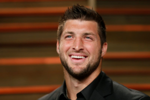 Former NFL player Tim Tebow arrives at the 2014 Vanity Fair Oscars Party in West Hollywood, California, U.S. on March 2, 2014.  <br/>REUTERS/Danny Moloshok/File Photo