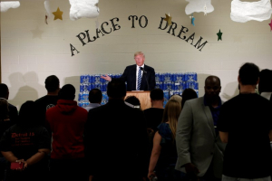 Republican presidential nominee Donald Trump speaks to a small group at the Bethel United Methodist Church in Flint, Michigan, U.S., September 14, 2016.  <br/>REUTERS/Mike Segar