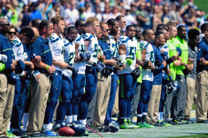 Seattle Seahawks lock arms during the National Anthem prior to a NFL game against the Los Angeles Rams at Los Angeles Memorial Coliseum. TODAY Sports <br/>Kirby Lee-USA 