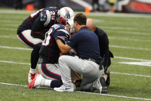 New England Patriots quarterback Jimmy Garoppolo (10) injured after a play against the Miami Dolphins in the first quarter at Gillette Stadium. TODAY Sports <br/>David Butler II-USA 