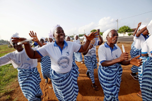 Women celebrate in Monrovia, Liberia after their country is declared Ebola free. Photo credit Ahmed Jallanzo/European Pressphoto Agency <br/>
