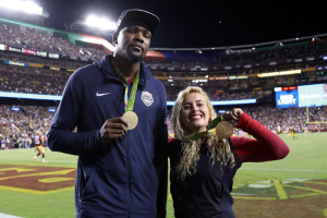 Rio Olympic gold medalists team USA mens basketball and Golden State Warriors forward Kevin Durant and Team USA wrestling's Helen Maroulis pose for a picture with their gold medals during the game between the Pittsburgh Steelers and the Washington Redskins at FedEx Field. The Steelers won 38-16.  <br/>Geoff Burke-USA TODAY Sports