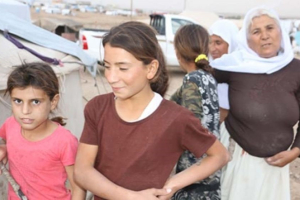 Rinda, 10, a Yazidi girl, was taken prisoner by ISIS and sold eight times to ISIS fighters. (Courtesy: Jan Kizihan) <br/>