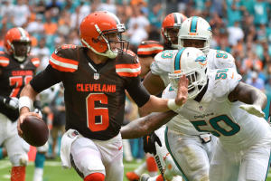 Cleveland Browns quarterback Cody Kessler (6) scrambles under pressure against the Miami Dolphins during the second half at Hard Rock Stadium.The Miami Dolphins defeat the Cleveland Browns 34-20 in overtime.  <br/> Jasen Vinlove-USA TODAY Sports