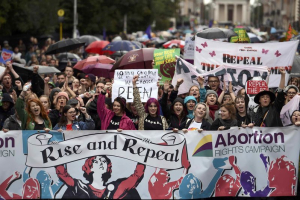 Demonstrators take part in a protest to urge the Irish Government to repeal the 8th amendment to the constitution, which enforces strict limitations to a woman's right to an abortion, in Dublin, Ireland September 24, 2016.  <br/>REUTERS/Clodagh Kilcoyne