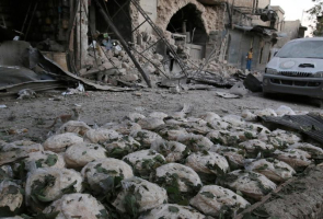 Stacks of bread are seen at a damaged site after an airstrike in the rebel-held Bab al-Maqam neighbourhood of Aleppo, Syria, September 28, 2016. REUTERS/Abdalrhman Ismail <br/>