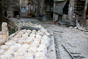 Stacks of bread are seen at a damaged site after an airstrike in the rebel-held Bab al-Maqam neighbourhood of Aleppo, Syria, September 28, 2016. REUTERS/Abdalrhman Ismail <br/>