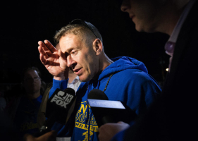 Bremerton High assistant football coach Joe Kennedy wipes his eyes as he talks to the media after a football game in Bremerton, Wash.<br />
 <br/>AP Photo