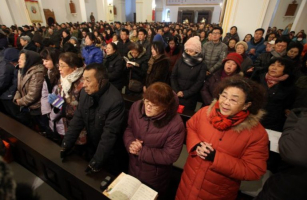 New religious rules scheduled to be adopted in China on Oct. 7, 2016, will negatively affect the church's open community there, warn Cathliocs. In addition, the rules will place hefty financial fines on unapproved religious actitivies and severly hamper local residents interaction with foreign supporters, say opponents.  <br/>CNS photo/Wu Hong 