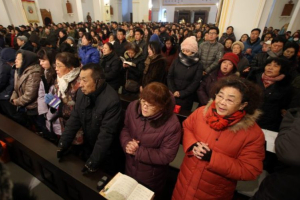 New religious rules scheduled to be adopted in China on Oct. 7, 2016, will negatively affect the church's open community there, warn Cathliocs. In addition, the rules will place hefty financial fines on unapproved religious actitivies and severly hamper local residents interaction with foreign supporters, say opponents.  <br/>CNS photo/Wu Hong 