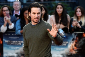 Actor Mark Wahlberg poses as he arrives at the European premiere of 