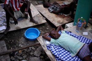 A boy receives treatment for cholera after Hurricane Matthew in the Hospital of Port-a-Piment, Haiti, October 9, 2016.  <br/>REUTERS/Andres Martinez Casares