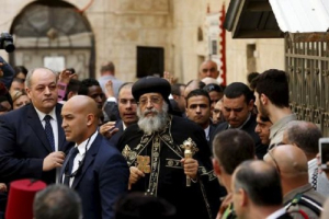 Egyptian Coptic Pope Tawadros II (C), head of the Coptic Orthodox church, arrives to the funeral of Anba Abraham, Coptic Orthodox Metropolitan Archbishop of Jerusalem and the Near East, in Jerusalem's Old City November 28, 2015.  <br/>Reuters/Ronen Zvulun