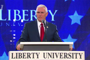 GOP vice presidential candidate Mike Pence (on left) urged attendees of a Liberty University Convocation on Wednesday to forgive GOP presidential candidate Donald Trump over the controversial recording from 2005 that shares Trump's disrespect and verbal talking of graphically groping women.  <br/>REUTERS / Carlo Allegri