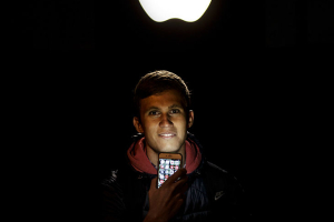 <br />
MADRID, SPAIN - SEPTEMBER, 16: Diego Silva poses for a picture as he illuminates himself with his mobile phone at Puerta del Sol Apple Store facade the dawn before the company launches their Iphone 7 and 7 Plus on September 16, 2016 in Madrid, Spain. High school student Diego Silva, 20, has been waiting for 6 hours at Puerta del Sol Apple Store outdoors in order to purchase his fifth Iphone model: an Iphone 7. Diego uses to change the model in official stores in order to try different colours, storage capacities or in order to take advantage of new offers: he did 8 changes with the Iphone 6 model. The iPhone 7 and iPhone 7 Plus has been launched on Friday September 16th in more than 25 countries. Customers have started to queue 38 hours before the opening of the store placed in the center of Madrid. (Photo by Gonzalo Arroyo Moreno/Getty Images) <br/>Credit: Gonzalo Arroyo Moreno / Stringer