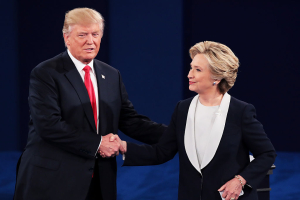 <br />
ST LOUIS, MO - OCTOBER 09: Republican presidential nominee Donald Trump (L) shakes hands with Democratic presidential nominee former Secretary of State Hillary Clinton during the town hall debate at Washington University on October 9, 2016 in St Louis, Missouri. This is the second of three presidential debates scheduled prior to the November 8th election. (Photo by Scott Olson/Getty Images) <br/>Credit: Scott Olson / Staff