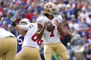 San Francisco 49ers quarterback Colin Kaepernick (7) drops back to pass during the first quarter against the Buffalo Bills at New Era Field.  <br/>Kevin Hoffman-USA TODAY Sports
