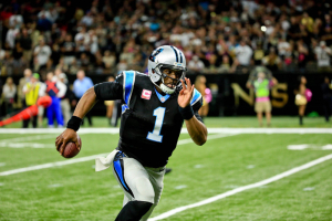 Carolina Panthers quarterback Cam Newton (1) runs for a touchdown against the New Orleans Saints during the fourth quarter of a game at the Mercedes-Benz Superdome. The Saints defeated the Panthers 41-38.  <br/>Derick E. Hingle-USA TODAY Sports