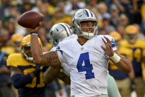 Dallas Cowboys quarterback Dak Prescott (4) throws the ball in the second quarter during the game against the Green Bay Packers at Lambeau Field.  <br/>Benny Sieu-USA TODAY Sports
