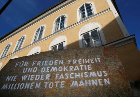 A stone outside the house in which Adolf Hitler was born, with the inscription 'For peace, freedom and democracy, never again fascism, millions of dead are a warning', is pictured in Braunau am Inn, Austria, September 24, 2012.  <br/>REUTERS/Dominic Ebenbichler/File Photo