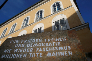 A stone outside the house in which Adolf Hitler was born, with the inscription 'For peace, freedom and democracy, never again fascism, millions of dead are a warning', is pictured in Braunau am Inn, Austria, September 24, 2012.  <br/>REUTERS/Dominic Ebenbichler/File Photo