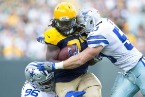 Dallas Cowboys defensive tackle Maliek Collins (96) and linebacker Sean Lee (50) tackle Green Bay Packers running back Eddie Lacy (27) during the second quarter at Lambeau Field.  <br/> Jeff Hanisch-USA TODAY Sports