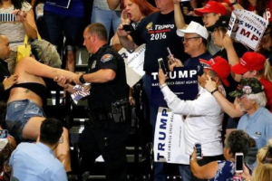 Police remove a protester during a rally by Republican U.S. presidential candidate Donald Trump and his supporters in Albuquerque, New Mexico. <br />
<br />
 <br/>Reuters/Jonathan Ernst