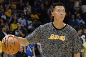 Los Angeles Lakers forward Yi Jianlian (11) warms up before the game against the Golden State Warriors at Valley View Casino Center.  <br/>Jake Roth-USA TODAY Sports