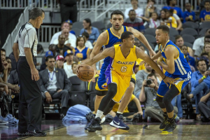 Los Angeles Lakers guard Jordan Clarkson (6) is defended by Golden State Warriors center Zaza Pachulia (27) and Golden State Warriors guard Stephen Curry (30) during the second quarter at T-Mobile Arena.  <br/>Joshua Dahl-USA TODAY Sports