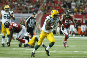 Green Bay Packers running back Knile Davis (30) runs after a catch in the second quarter of their game against the Atlanta Falcons at the Georgia Dome. The Falcons won 33-32.  <br/>Mandatory Credit: Jason Getz-USA TODAY Sports