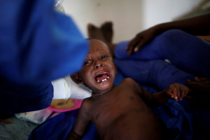 A child receives treatment at the cholera treatment center at the hospital after Hurricane Matthew hit Jeremie, Haiti,  <br/>October 13, 2016. REUTERS/Carlos Garcia Rawlins
