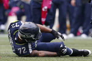 Seattle Seahawks defensive end Michael Bennett (72) reacts after suffering an injury during the third quarter against the Atlanta Falcons at CenturyLink Field. Seattle defeated Atlanta, 26-24.  <br/>Mandatory Credit: Joe Nicholson-USA TODAY Sports