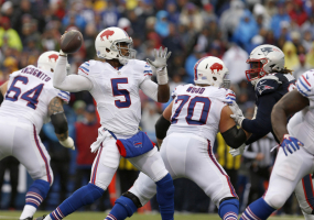 Buffalo Bills quarterback Tyrod Taylor (5) throws a pass during the first half against the New England Patriots at New Era Field.  <br/>Mandatory Credit: Timothy T. Ludwig-USA TODAY Sports